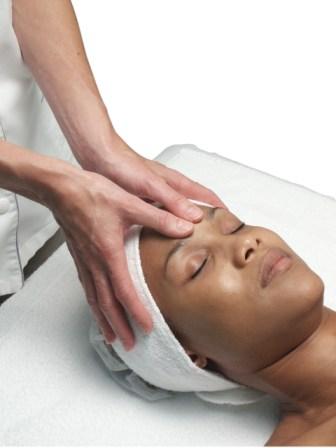 Lady receiving head massage